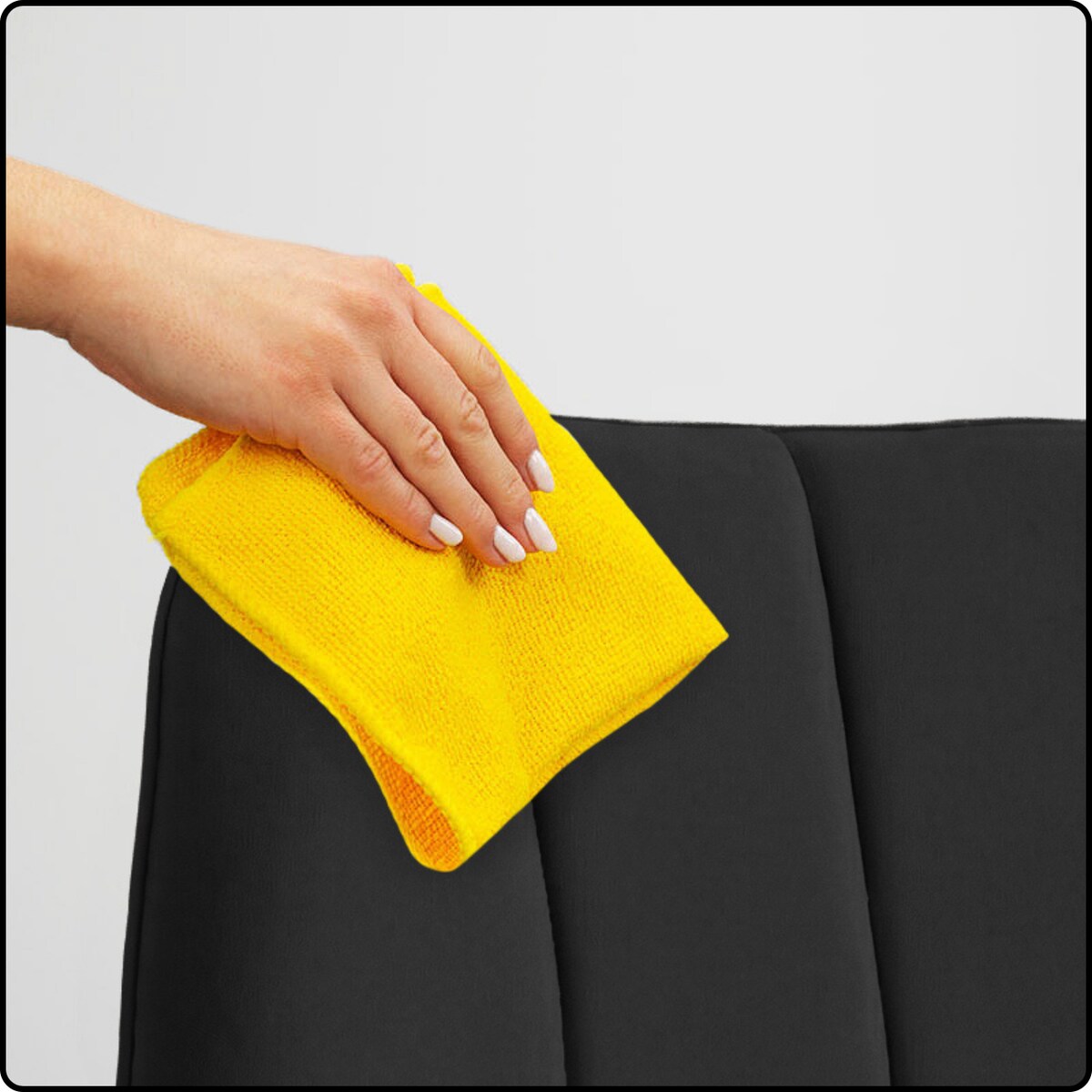 Fotel uszak tapicerowany welurowy wygodny z czarnymi nogami do salonu czarny