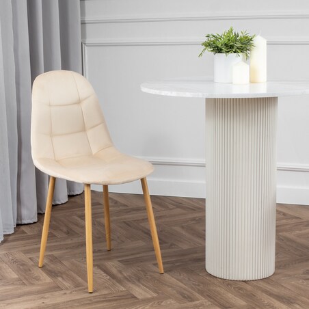 Krzesło tapicerowane welurowe beżowe do salonu jadalni pikowane