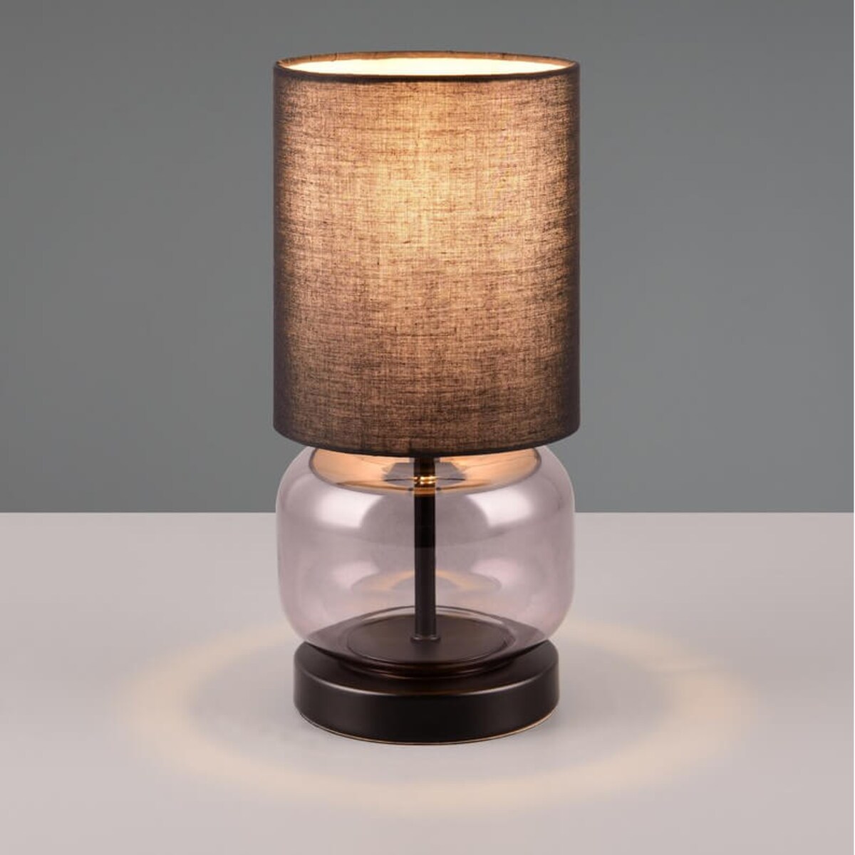 Tkaninowa lampa stołowa Elio 517800154 Trio czarna przydymiona