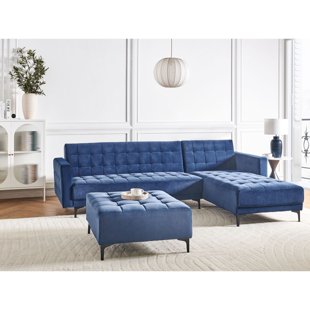 Sofa rozkładana lewostronna welurowa z otomaną niebieska ABERDEEN