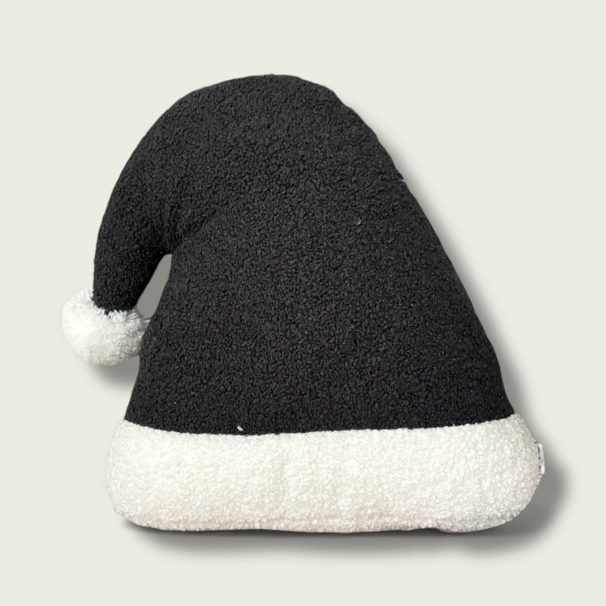 Poduszka w kształcie czapki Mikołaja czarna boucle