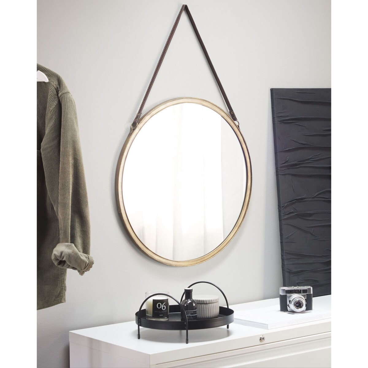 Metalowe okrągłe lustro ścienne na pasku ø 60 cm złote AUTUN