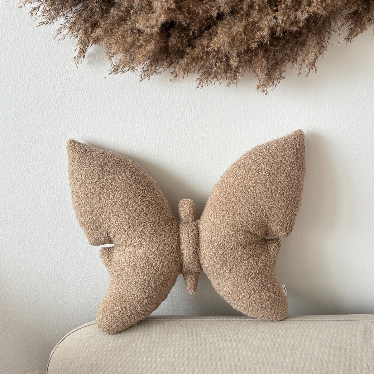 Poduszka dekoracyjna Motyl boucle beżowa