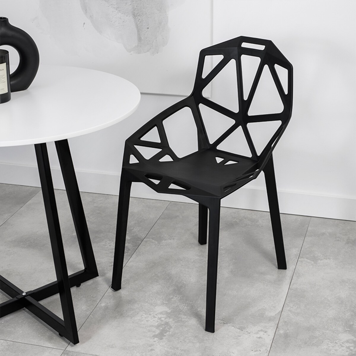 Krzesło plastikowe nowoczesne ażurowe czarne do salonu jadalni na taras