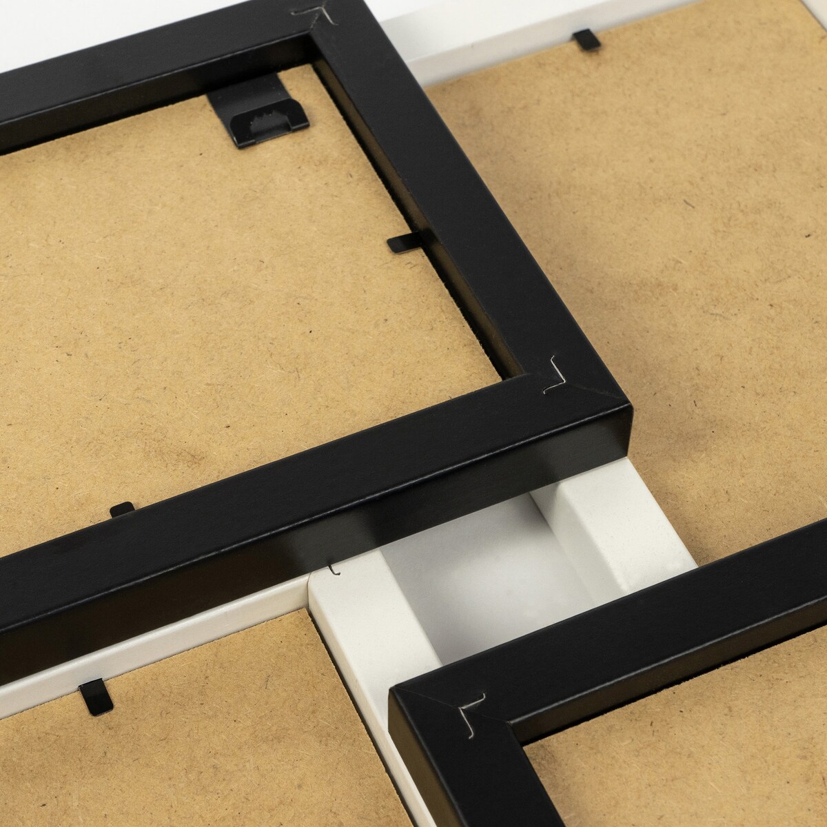 Multirama ramka na zdjęcia. Czarno-biała multirama na cztery zdjęcia 10x15 cm Ramka na zdjęcia 4 w 1 MULTI HEN 1-2 FRAMAI