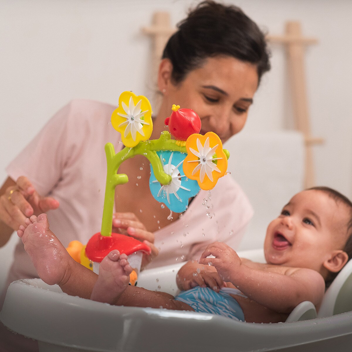 Karuzela sensoryczna do wanny wirujące kwiaty - Opakowanie z okienkiem