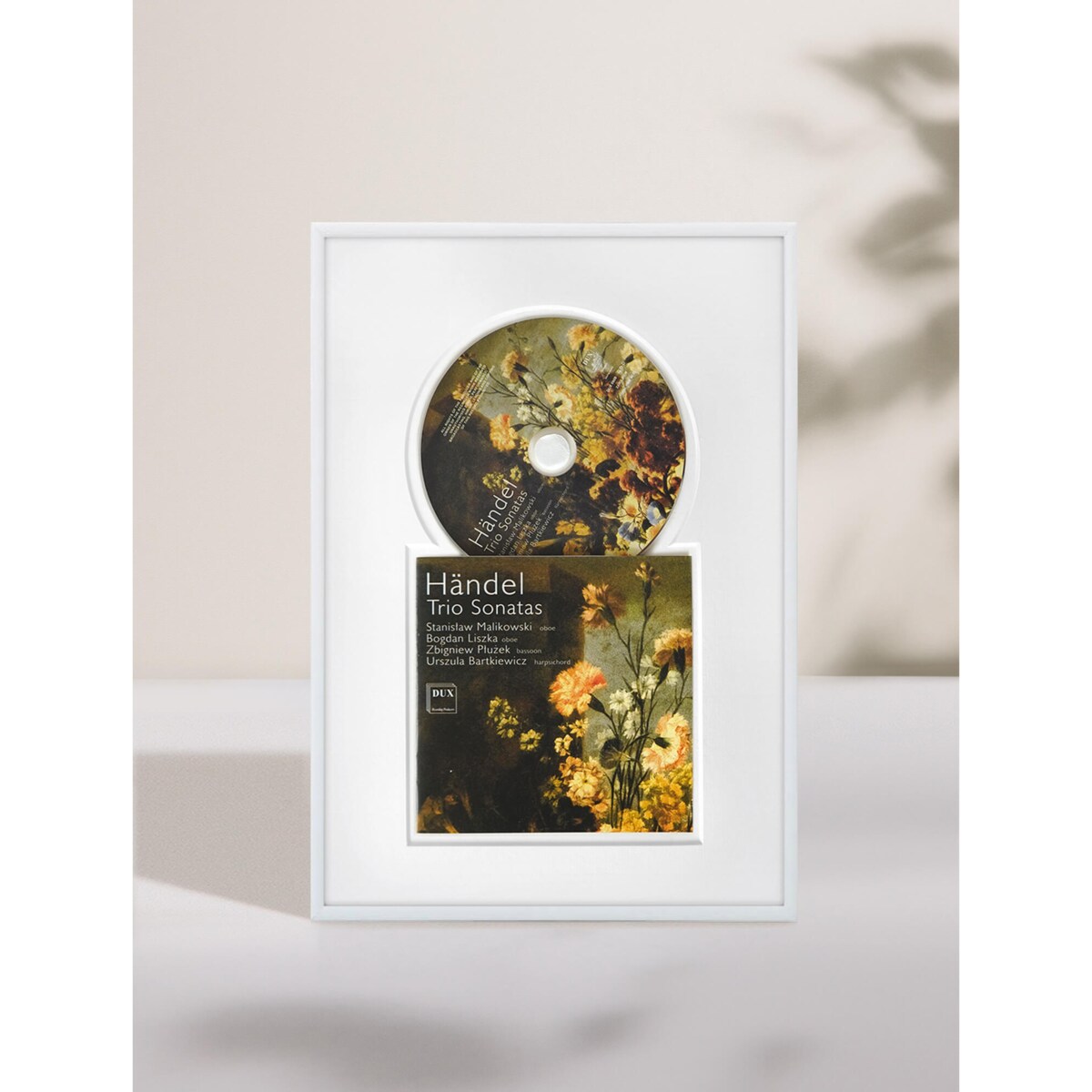 Ramka na płytę CD w kolorze białym. Ramka aluminiowa o rozmiarze 21x30 cm LUCA®
