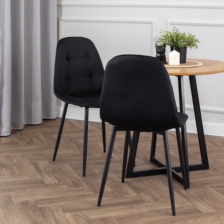 Krzesło tapicerowane czarne welurowe pikowane guziki do salonu