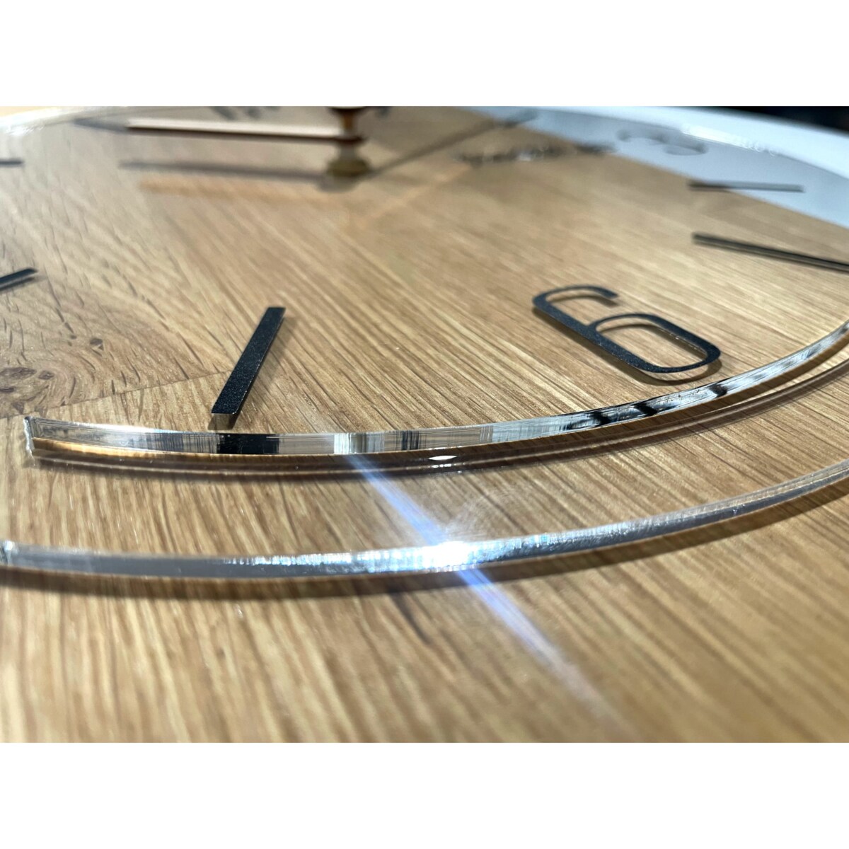 Drewniany zegar ścienny Geometric 40cm tarcza przezroczysta