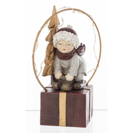 Dekoracja - chłopczyk na sankach na pudełku LED 13x7x8 cm