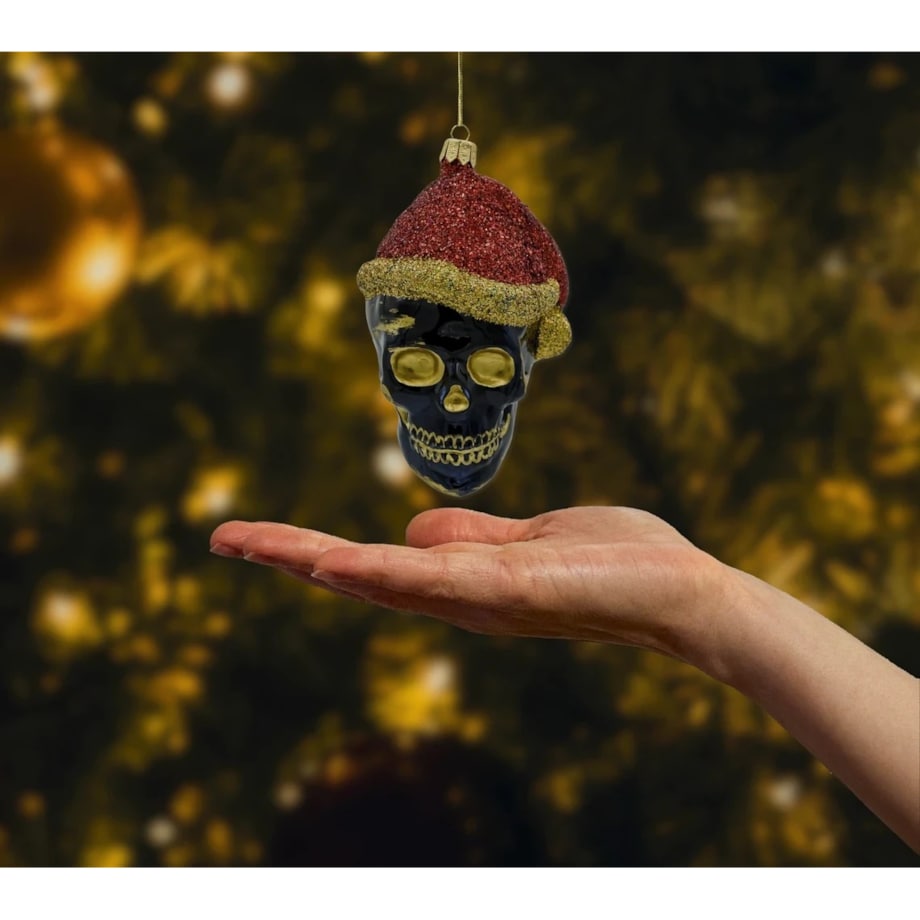 Bombka choinkowa: Czaszka w czapce świętego Mikołaja z złotymi akcentami