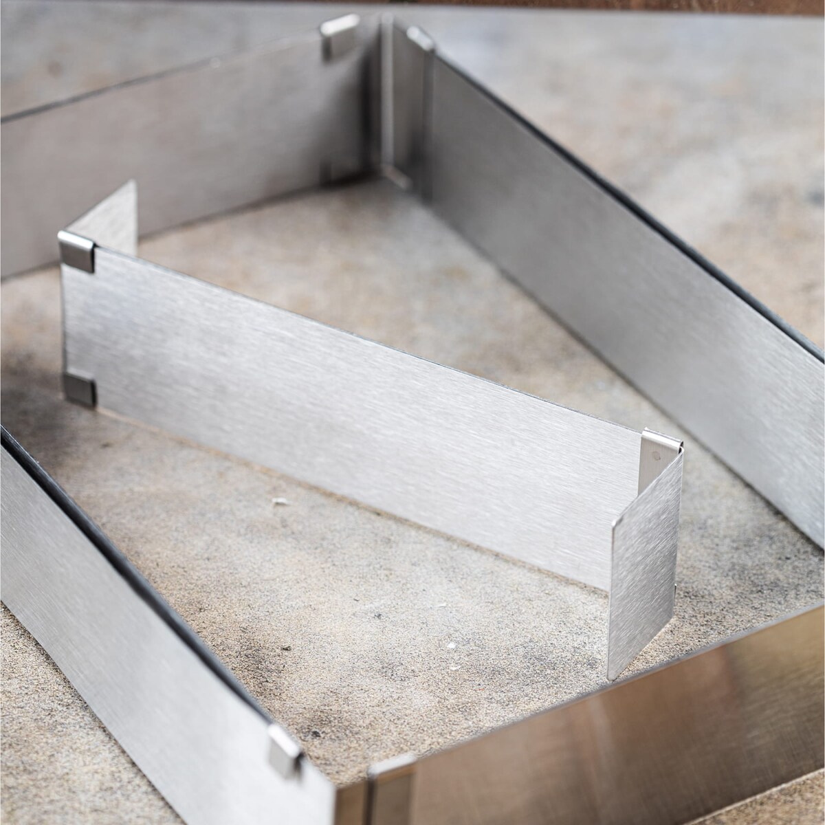 Regulowana forma do ciasta 34-52x27-18,5x5cm Tortownica Rant cukierniczy KINGHOFF