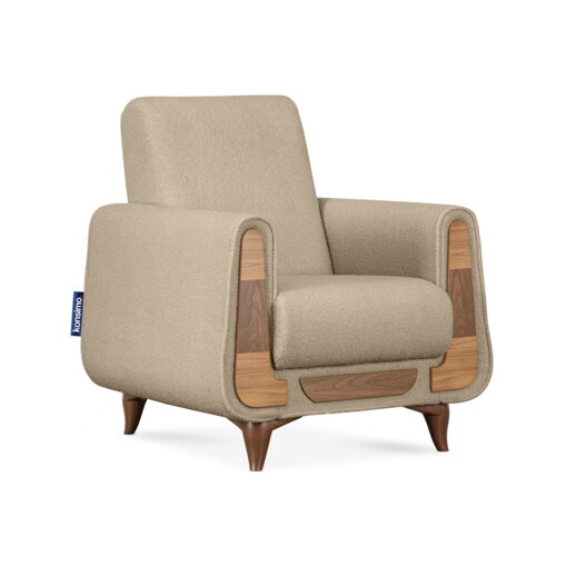KONSIMO GUSTAVO Fotel w kolorze beżowym wykonany z tkaniny jagnięcej