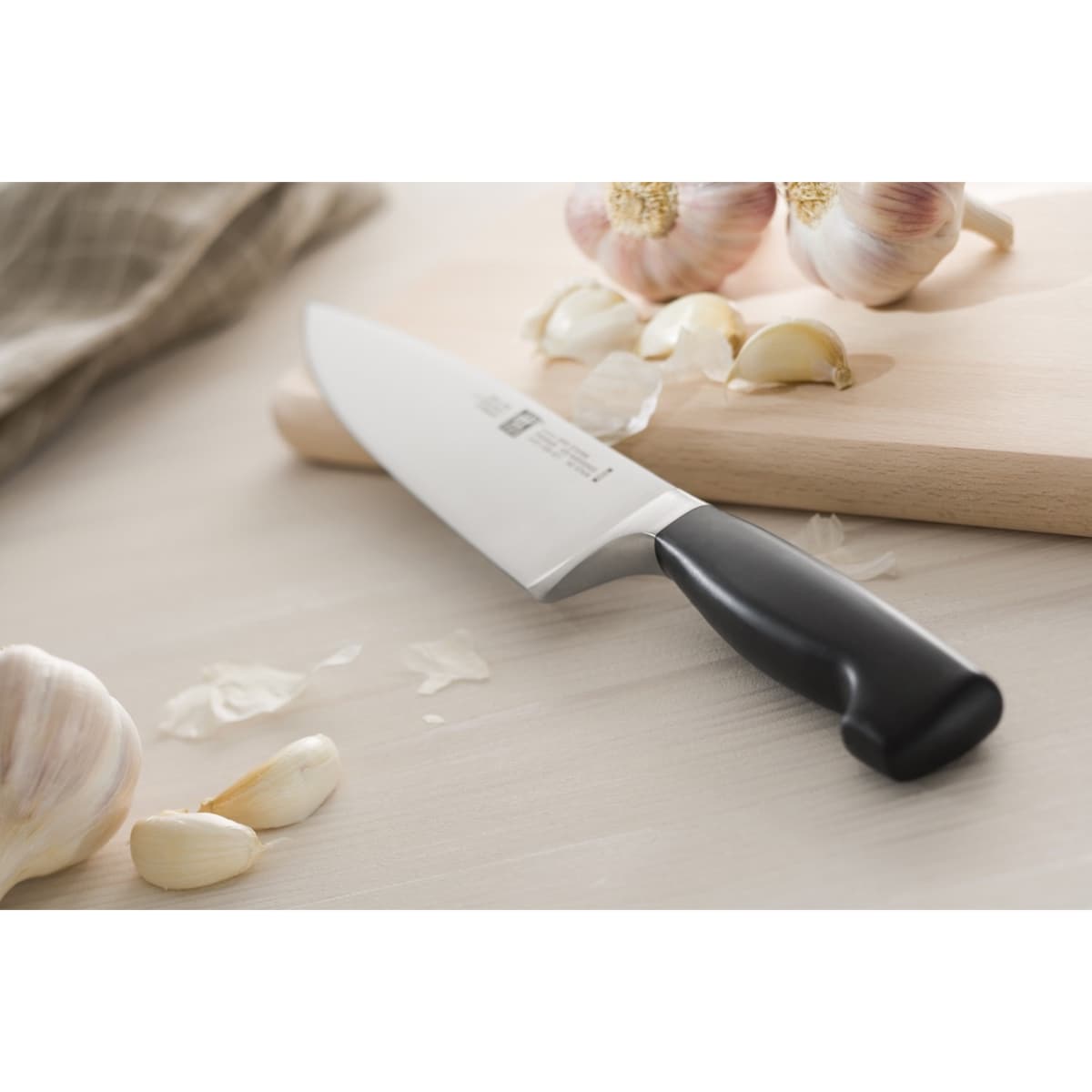 Nóż szefa kuchni Zwilling Four Star - 16 cm