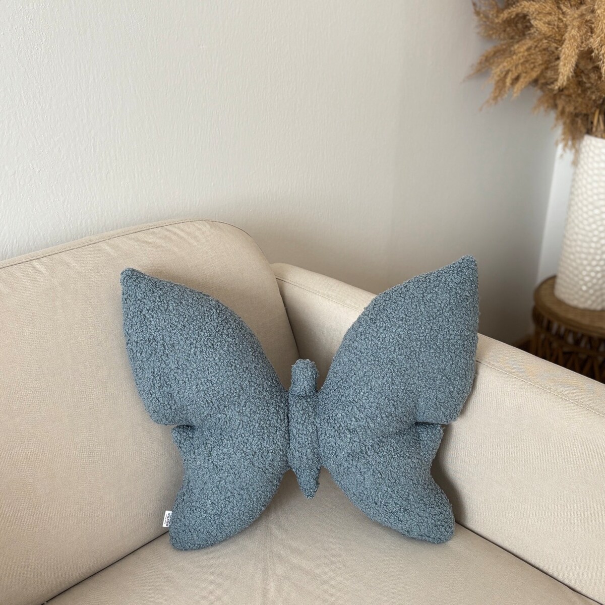 Poduszka dekoracyjna Motyl niebieski boucle