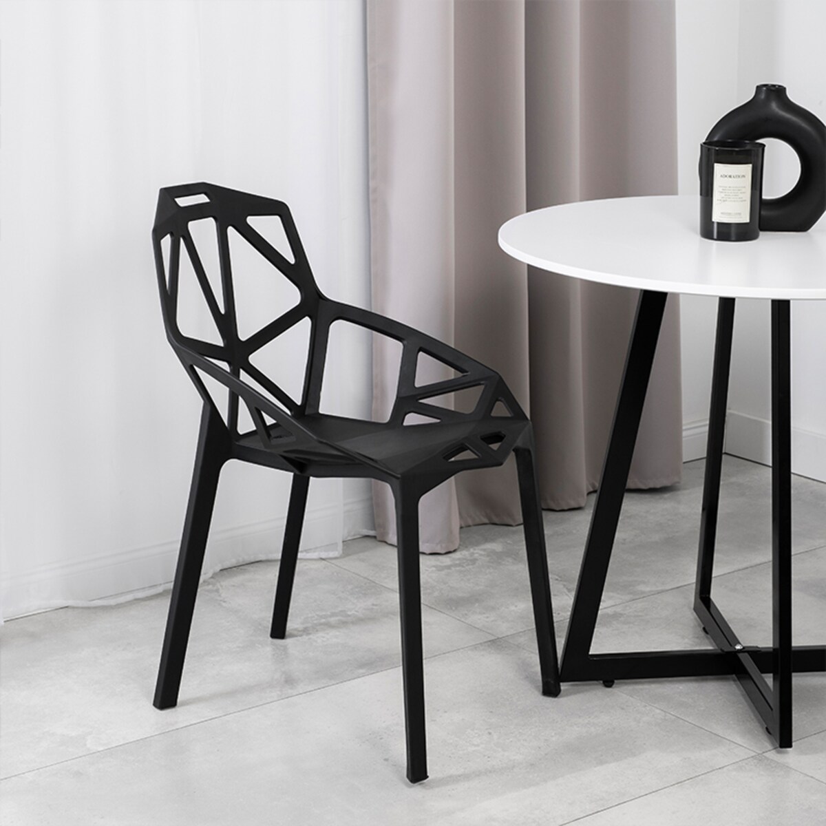 Krzesło plastikowe nowoczesne ażurowe czarne do salonu jadalni na taras