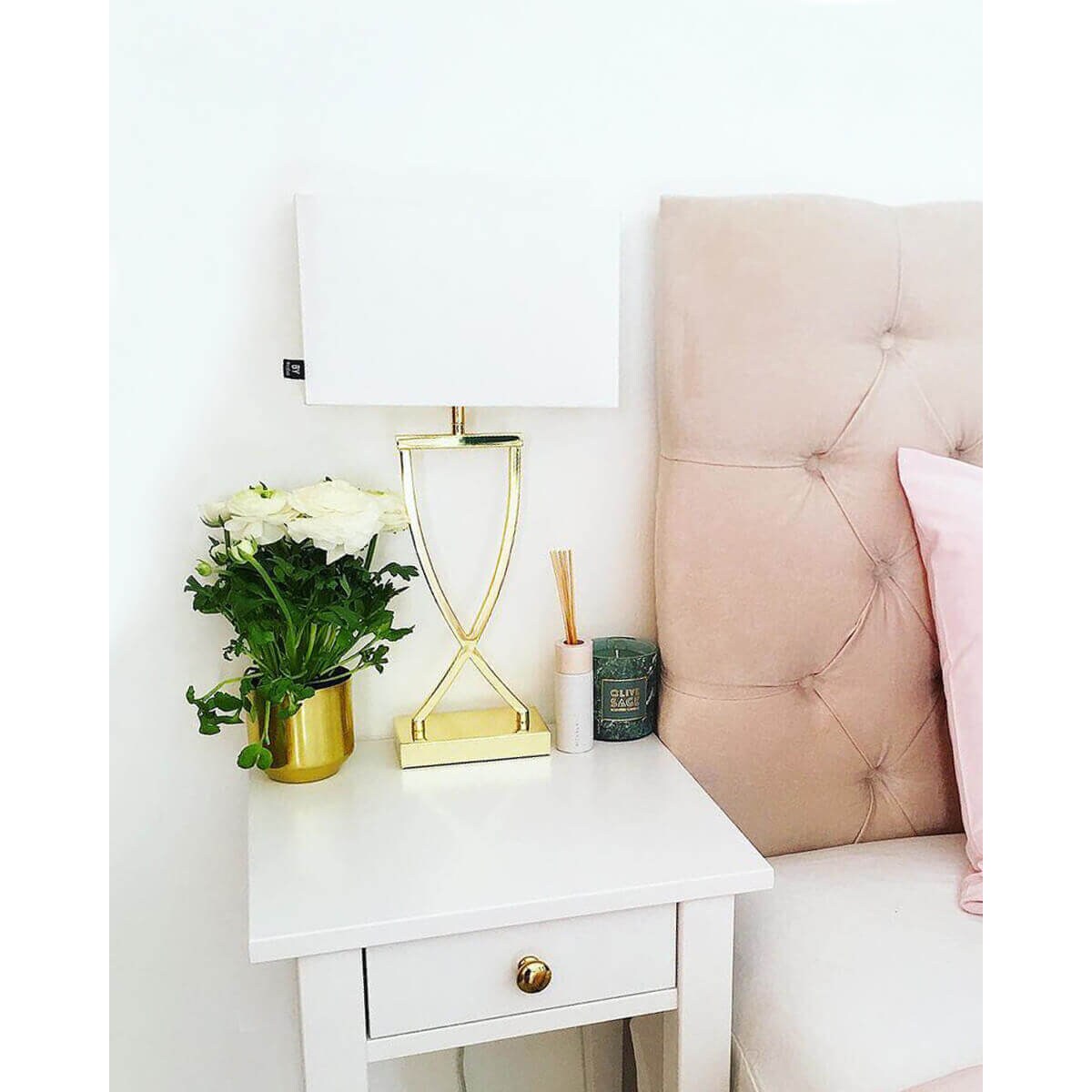 Stojąca lampa sypialniana Omega na szafkę nocną biała złota