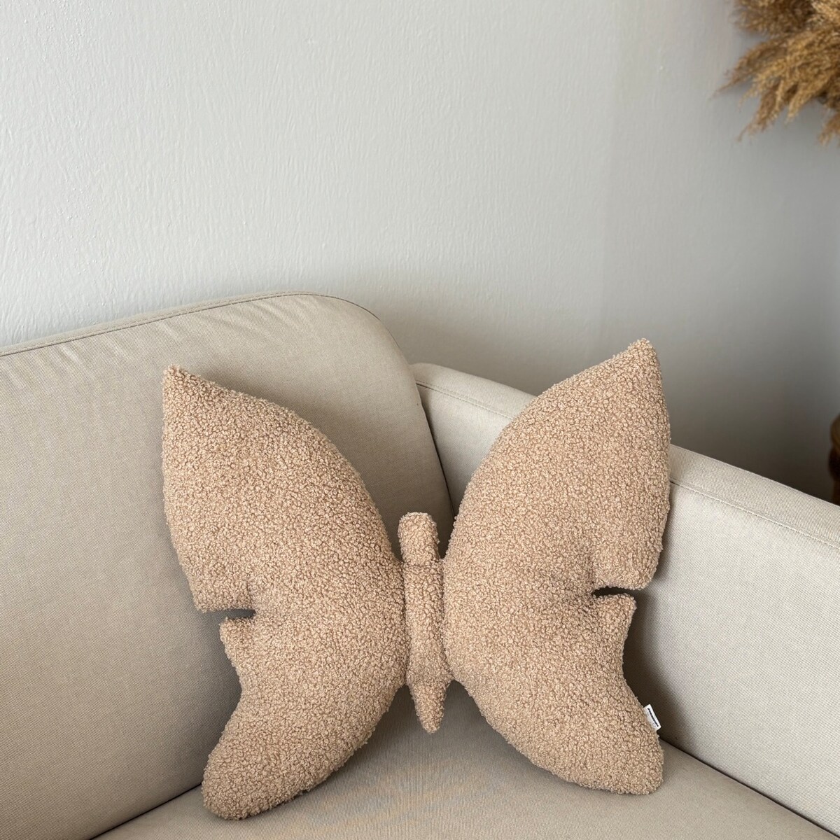 Poduszka dekoracyjna Motyl boucle beżowa