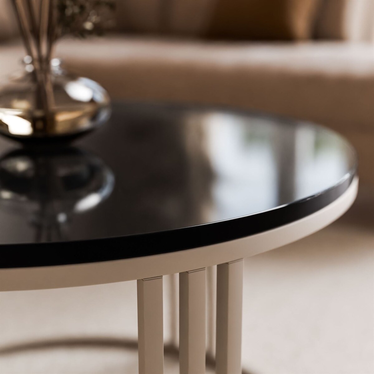 Okrągły stolik kawowy LORI POŁYSK na kaszmirowym stelażu, blat czarny połysk