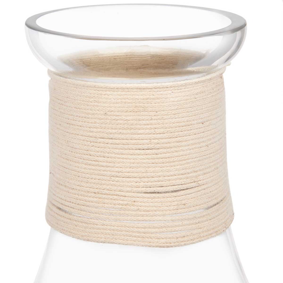 Ozdobna butelka w plecionce ze sznurka