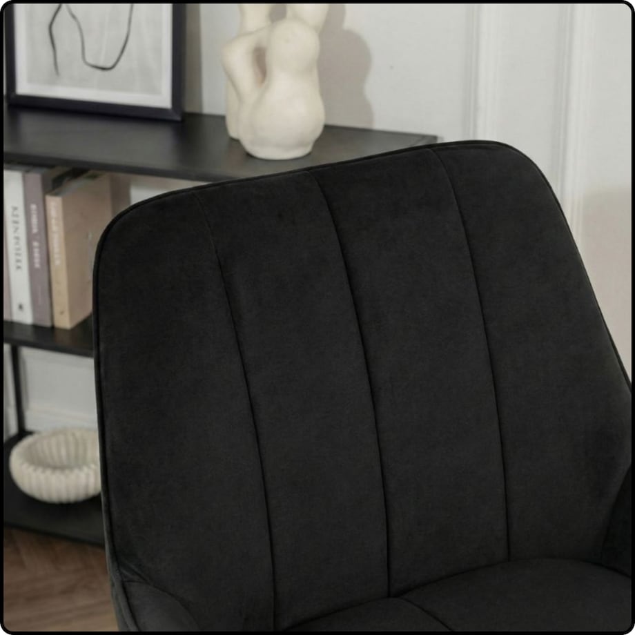 Fotel uszak tapicerowany welurowy wygodny z czarnymi nogami do salonu czarny
