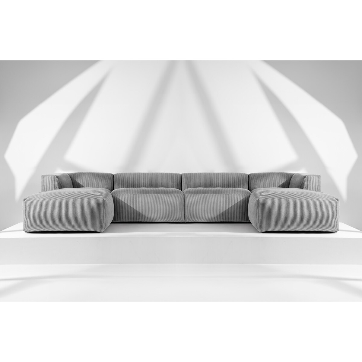 KONSIMO BUFFO 7/8-osobowa panoramiczna sofa narożna z wyjątkowo miękkim siedziskiem, kolor jasny szary