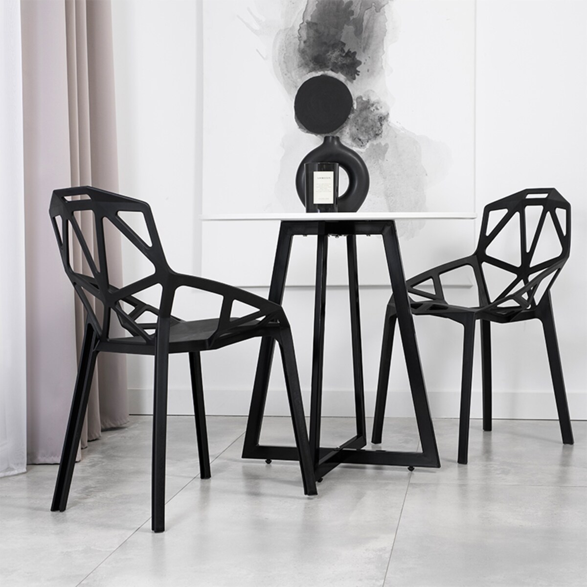 Krzesło plastikowe nowoczesne ażurowe czarne do salonu jadalni na taras