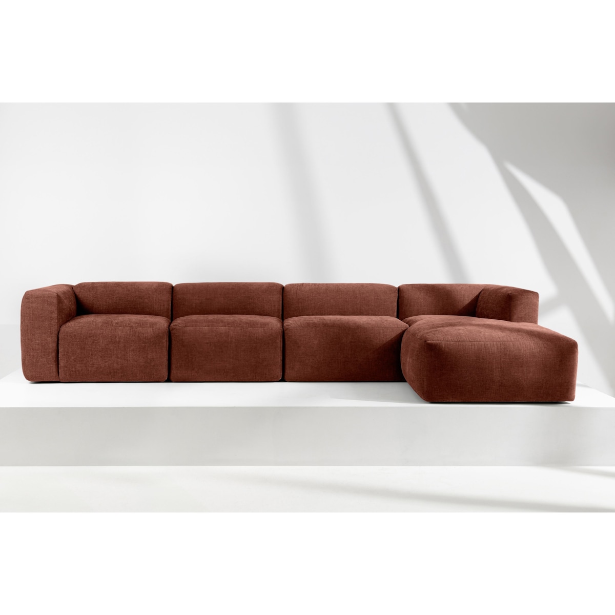 KONSIMO BUFFO Sofa narożna prawa 6-osobowa z wyjątkowo miękkim siedziskiem, kolor pomarańczowy