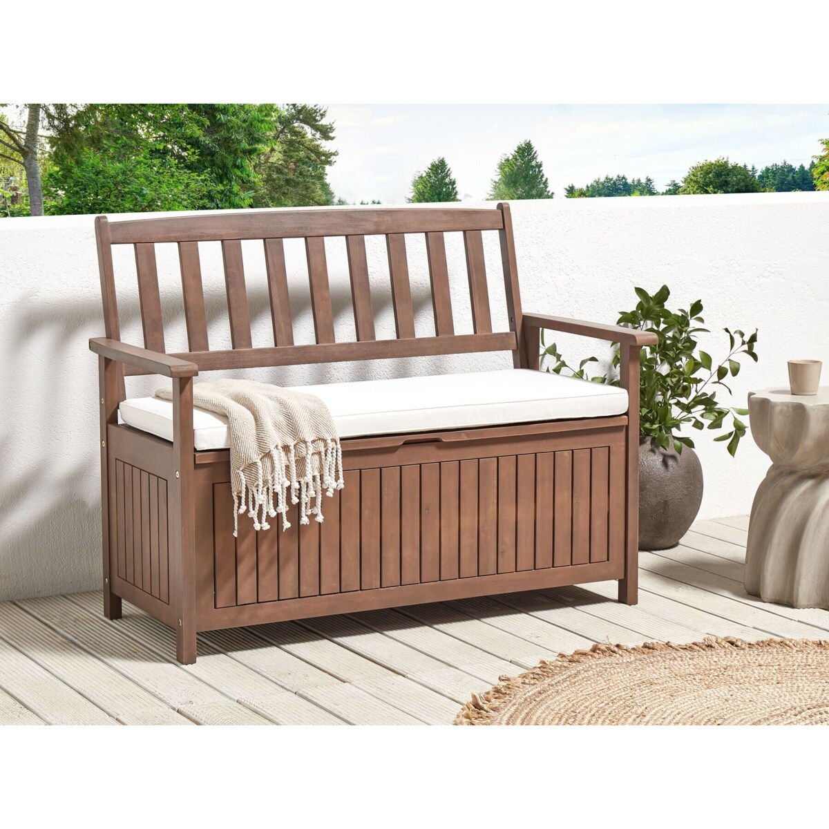 Ławka ogrodowa ze schowkiem 120 cm drewniana ciemna z poduszką białą SOVANA