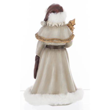 Mikołaj w płaszczu obszytym białym futrem ze złotą choinką i skarpetą z prezentami 22x14x14 cm