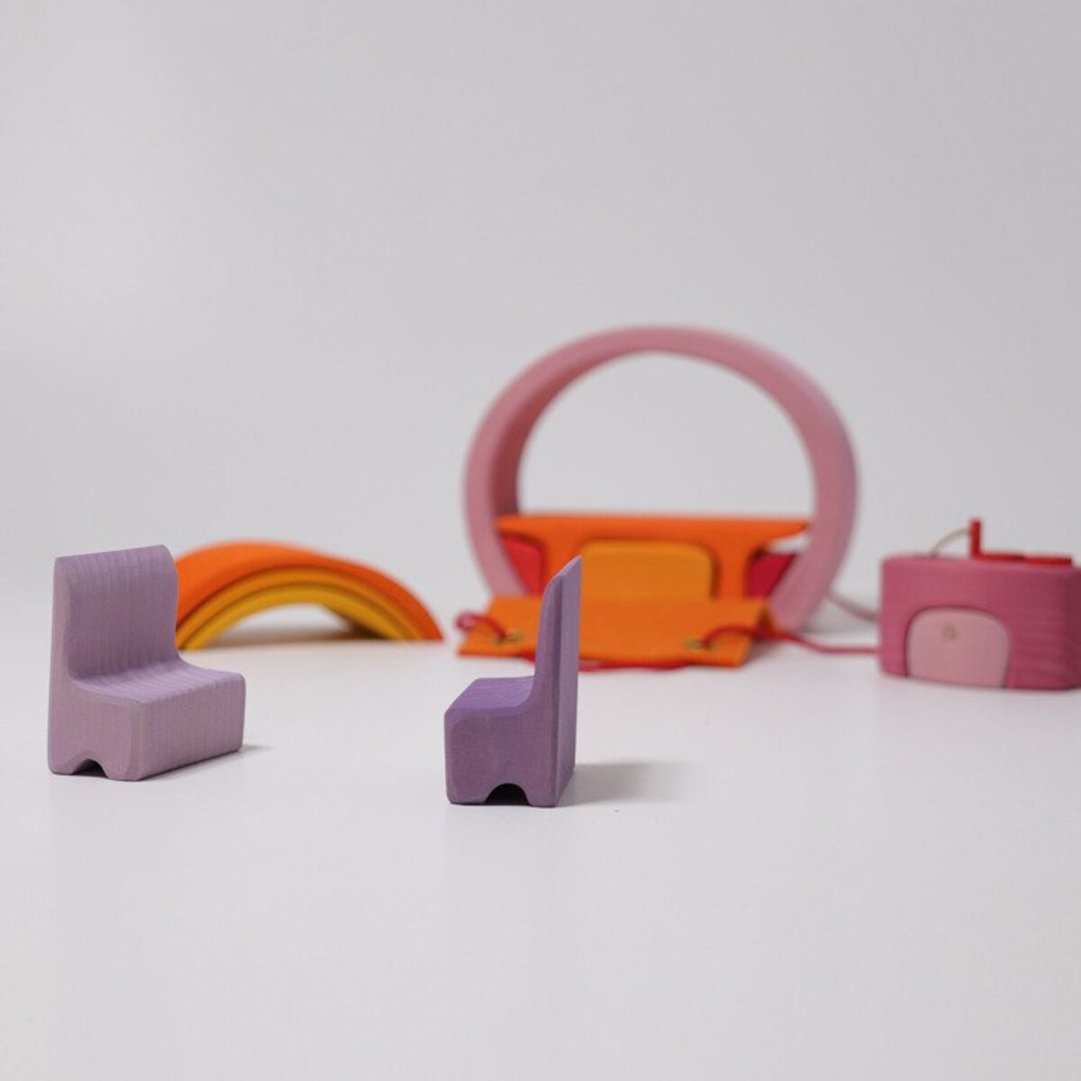 Dom mobilny do złożenia - drewniane klocki Grimm's różowo-pomarańczowye 3+