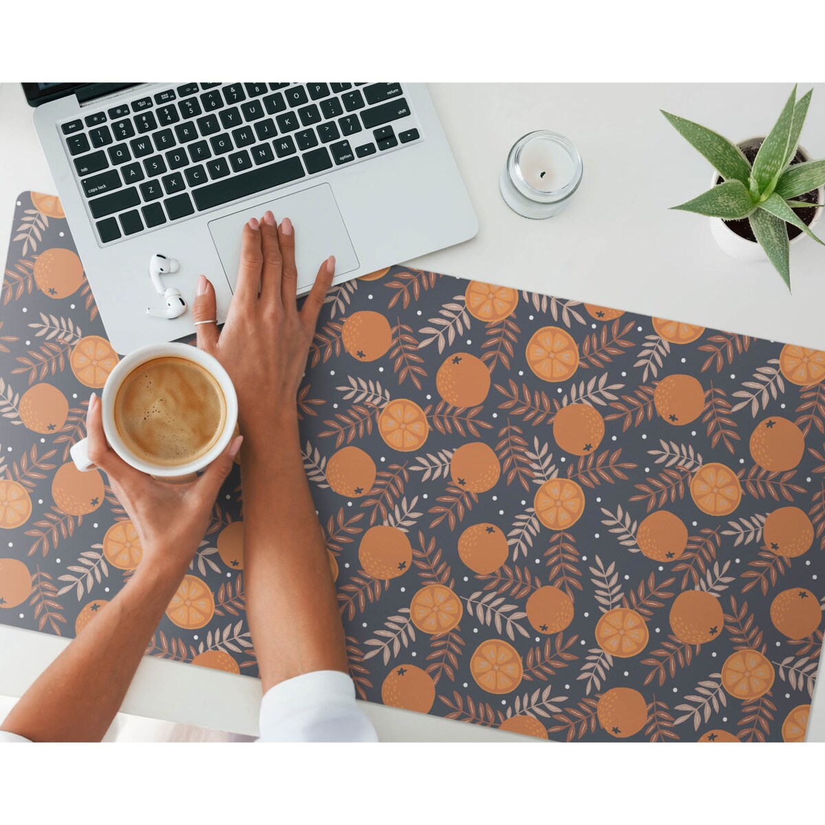 Pomarańczowa mata na biurko Pomarańcze i liście, 100x50 cm