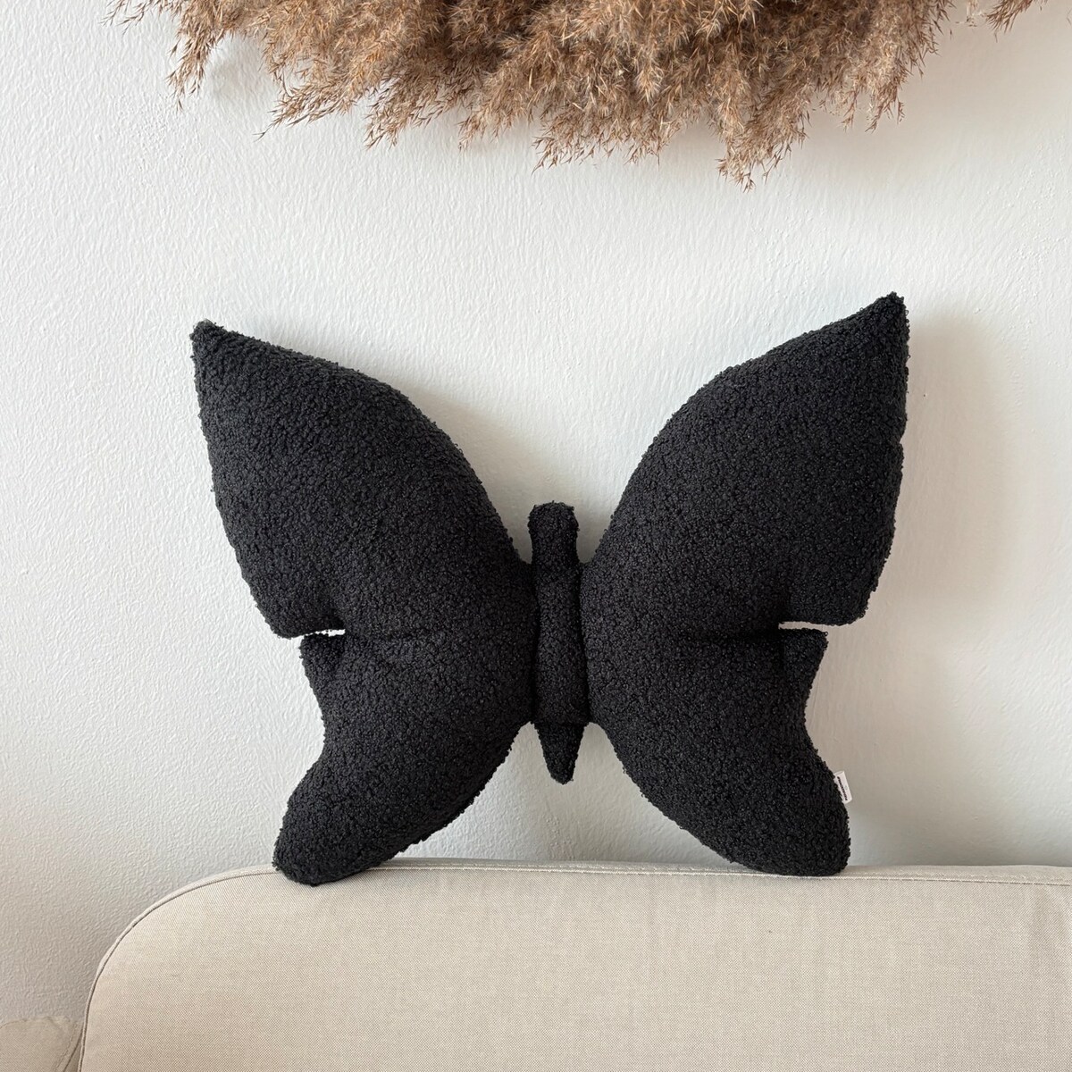 Poduszka dekoracyjna Motyl czarna boucle