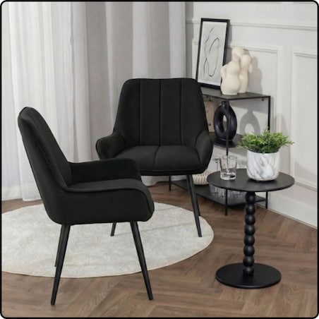 Fotel uszak tapicerowany welurowy wygodny z czarnymi nogami do salonu czarny