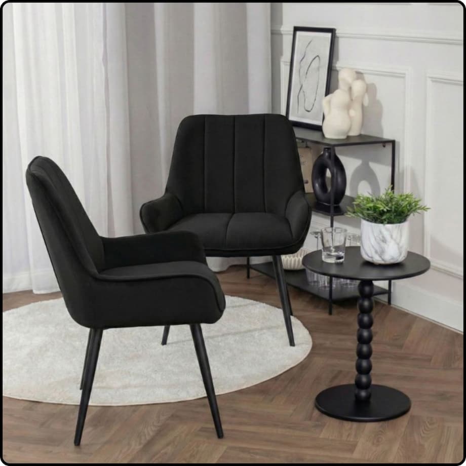 Fotel uszak tapicerowany welurowy wygodny z czarnymi nogami do salonu czarny