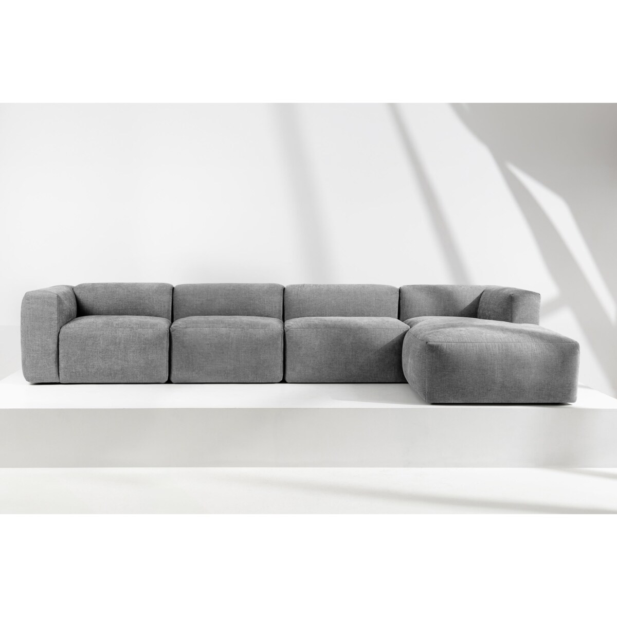 KONSIMO BUFFO Sofa narożna prawa 6-osobowa z wyjątkowo miękkim siedziskiem, kolor popielaty