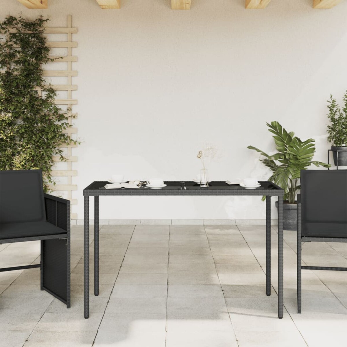 vidaXL Stół ogrodowy ze szklanym blatem, czarny, 115x54x74 cm