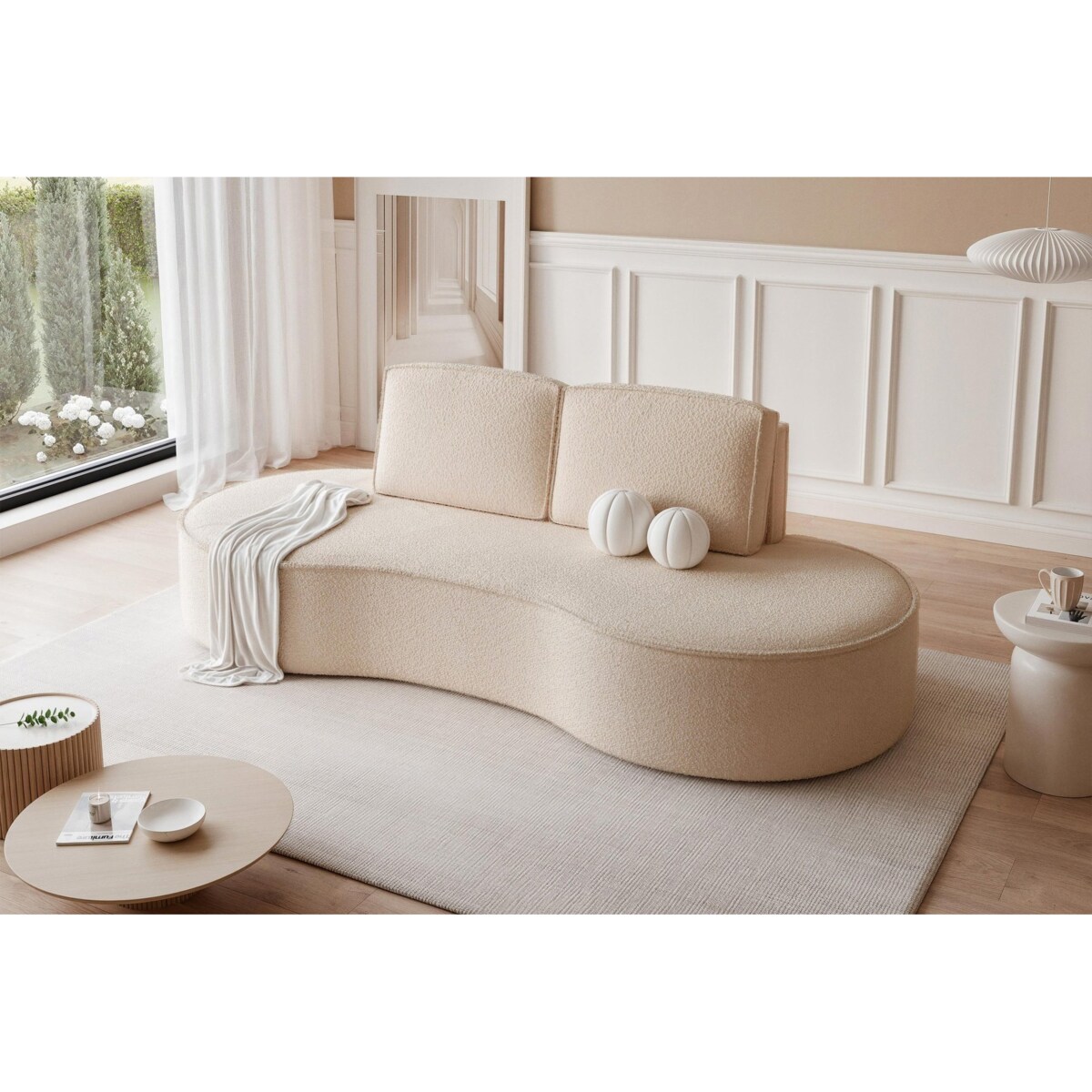 Beżowa sofa tapicerowana do salonu SOFIA o zaokrąglonych bokach - boucle