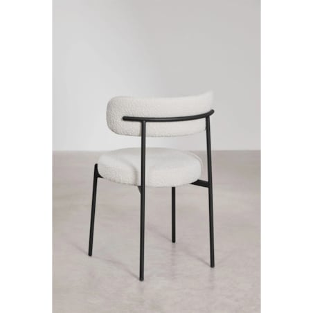Krzesło na czarnej podstawie bouclé Anisa
