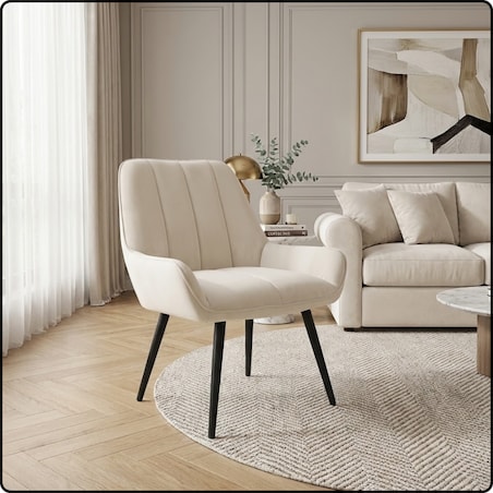 Fotel uszak tapicerowany welurowy wygodny z czarnymi nogami do salonu beżowy