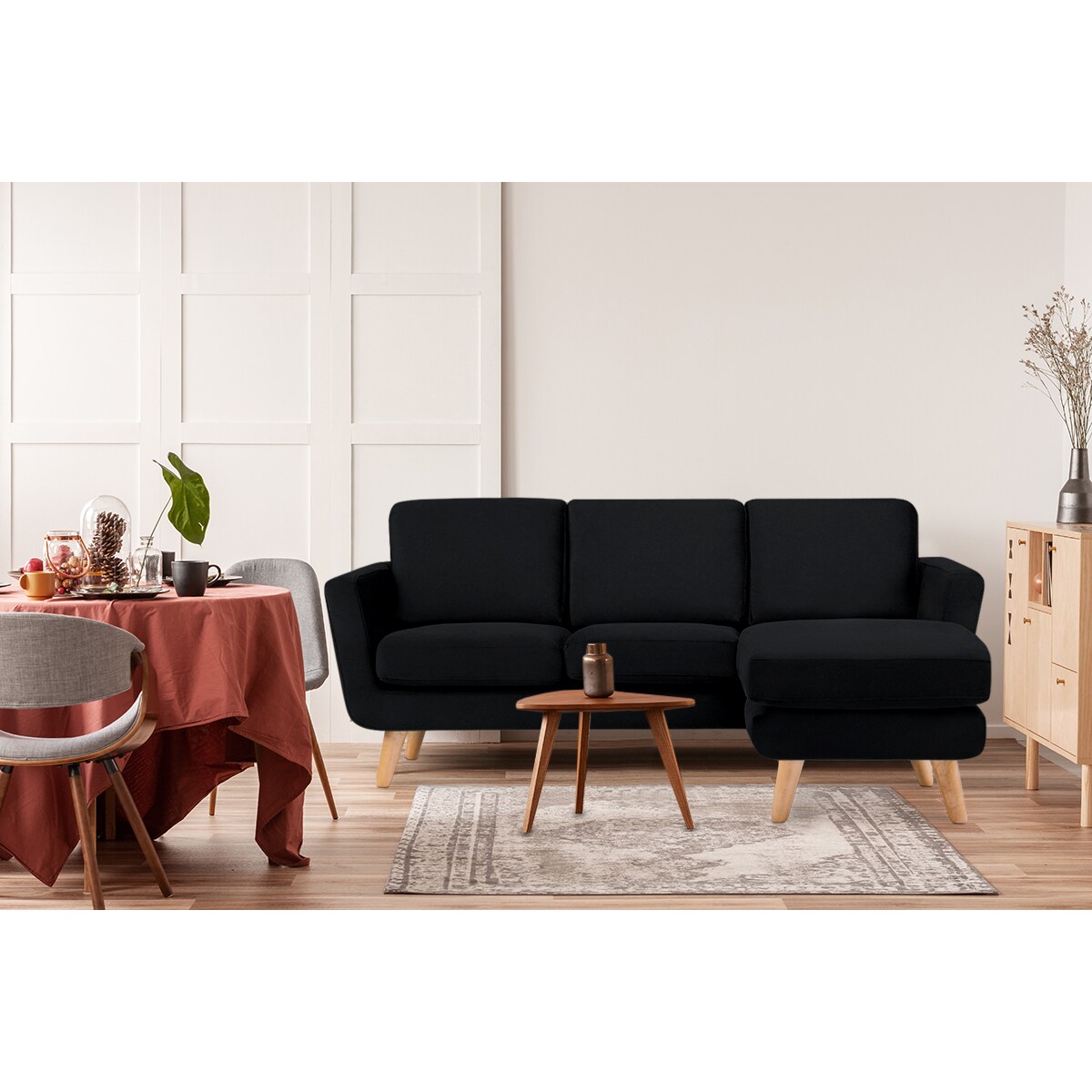 KONSIMO TAGIO Czarny narożnik skandynawski z pufą/ otomaną, prawy