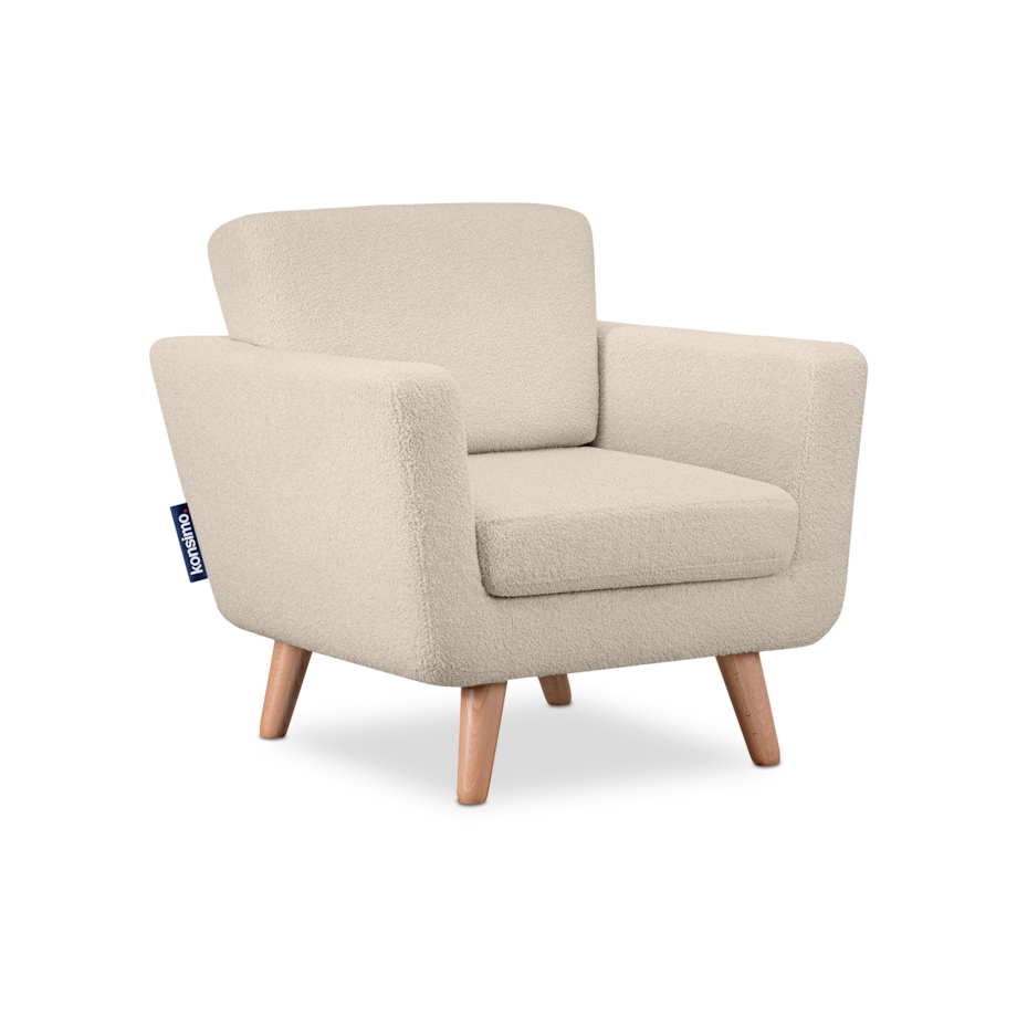 KONSIMO TAGIO Kremowy fotel skandynawski z tkaniny jagnięcej