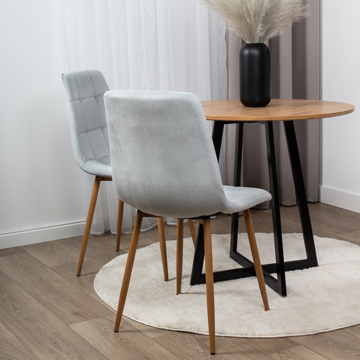 Krzesło tapicerowane do salonu szare welurowe pikowane