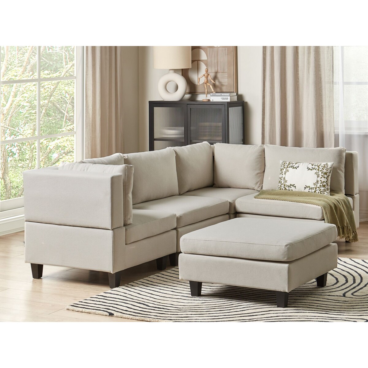 Tapicerowany lewostronny narożnik modułowy 4-osobowy z otomaną jasnobeżowy UNSTAD