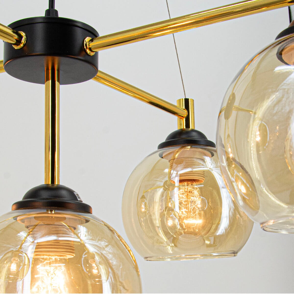 Wisząca lampa regulowana Vivien 6301/5 BL TR szklany klosz kaskada złoty czarny