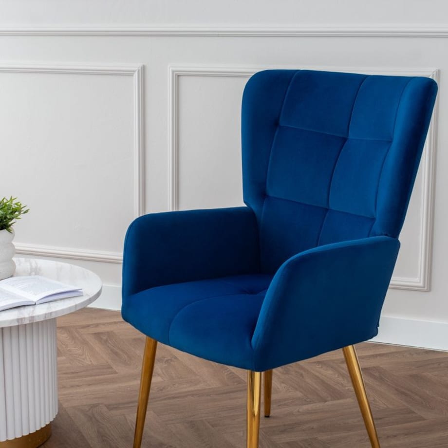 Fotel uszak do salonu wypoczynkowy welurowy tapicerowany granatowy złote nogi