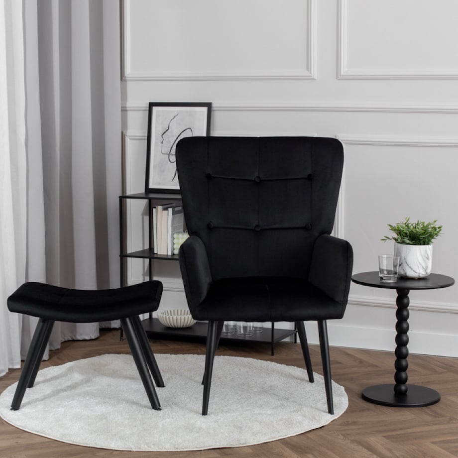 Fotel uszak z podnóżkiem do salonu wypoczynkowy welurowy tapicerowany czarny