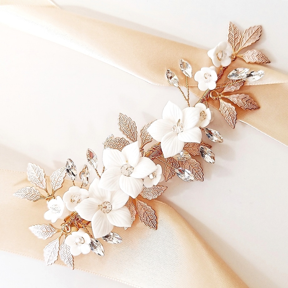 Efektowna złota spinka do włosów z kwiatami i cyrkoniami