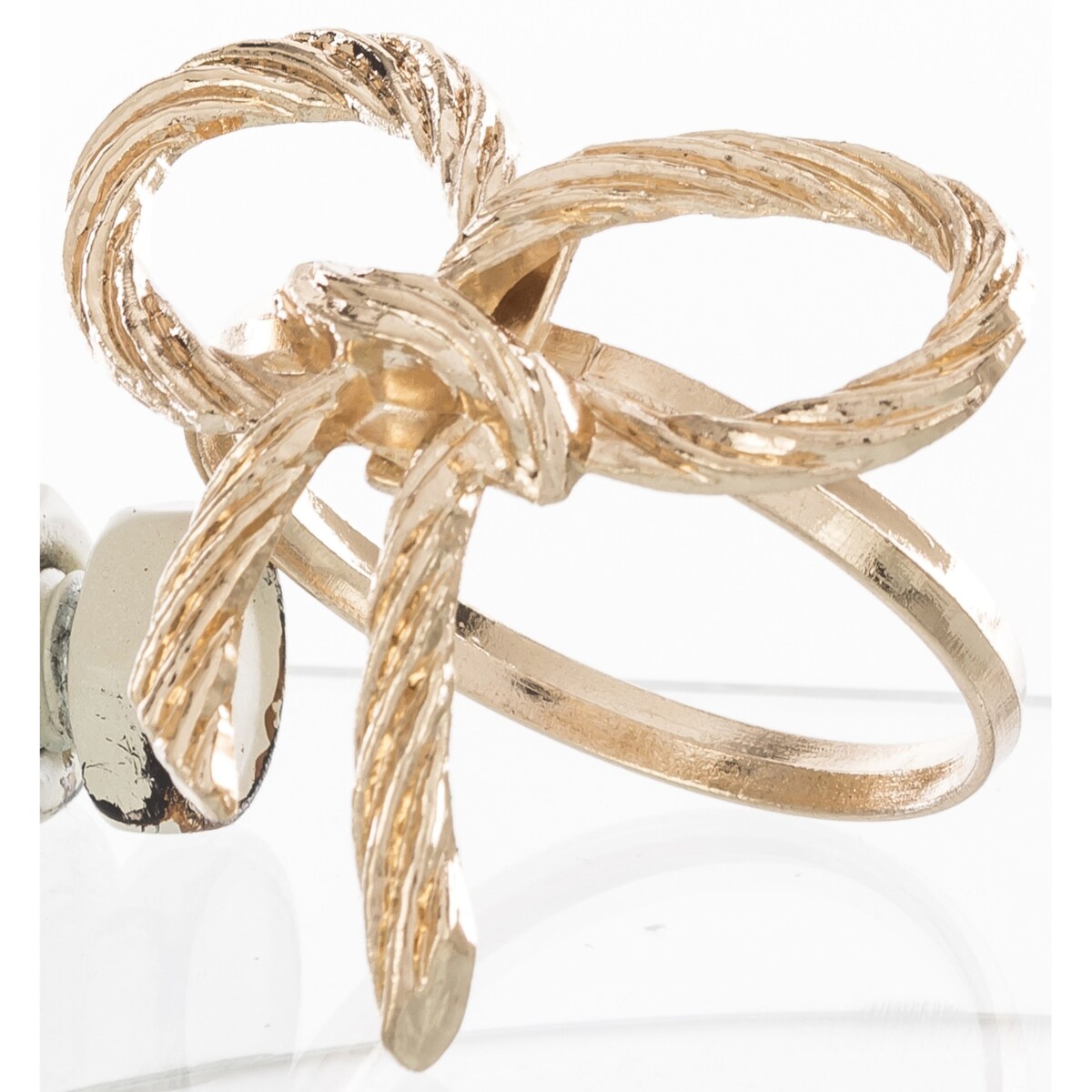 Komplet 4 złotych obrączek na serwetki, kokardki