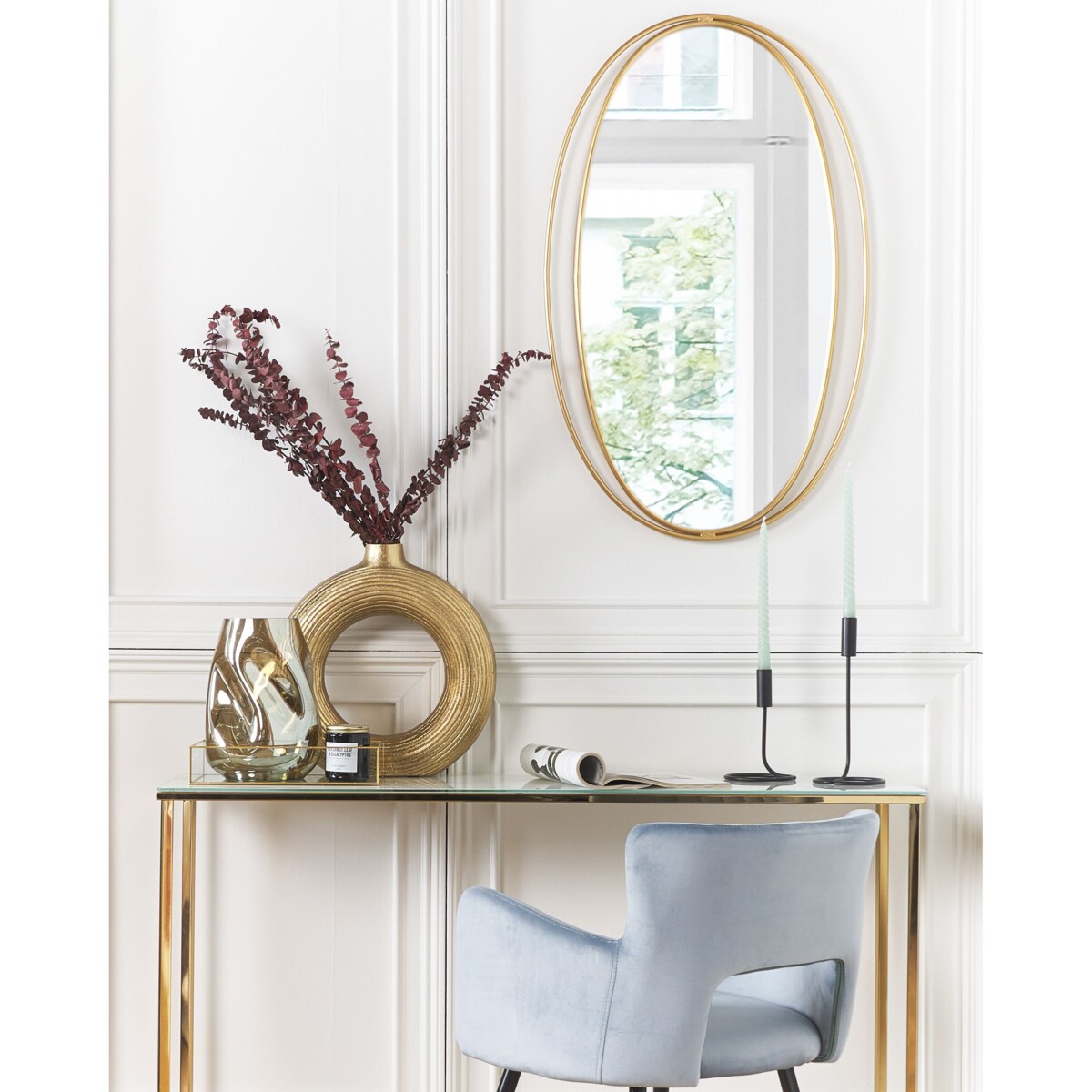 Stalowe owalne lustro ścienne 55 x 90 cm złote BESSON